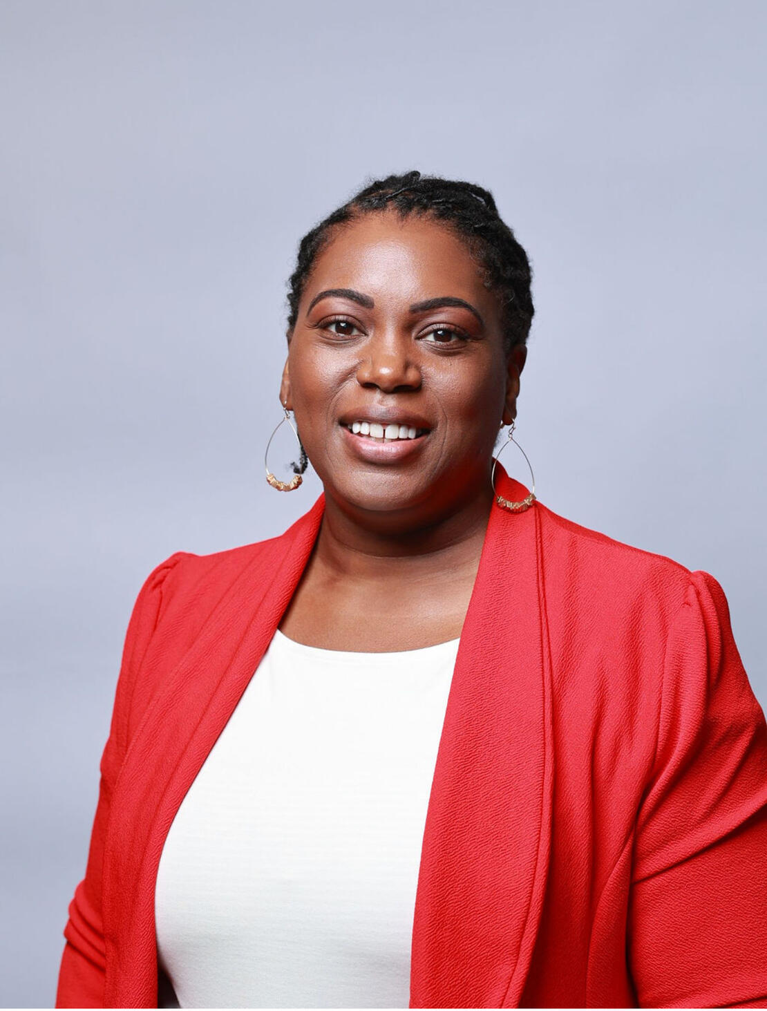 Tiffany - Headshot Nexus Learning Solutions Logo - Nexus is spelled out in navy blue and learning solutions appears below it in a golden yellow. Three nodes are connected and running between the logo. Each node contains a letter of the company name: N L S.